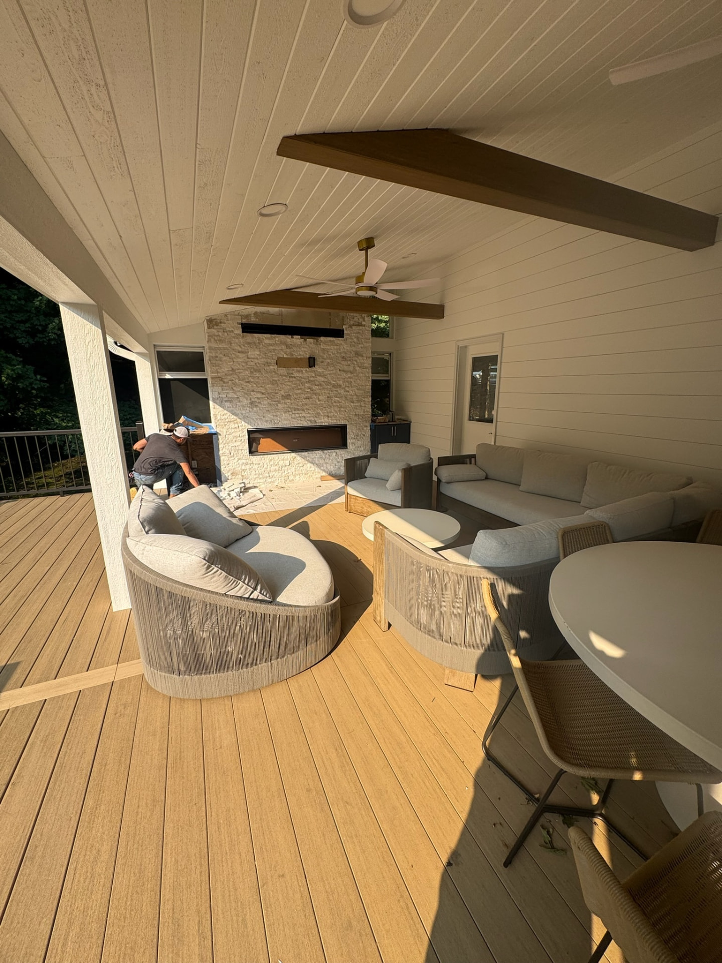 Covered deck with stone fireplace