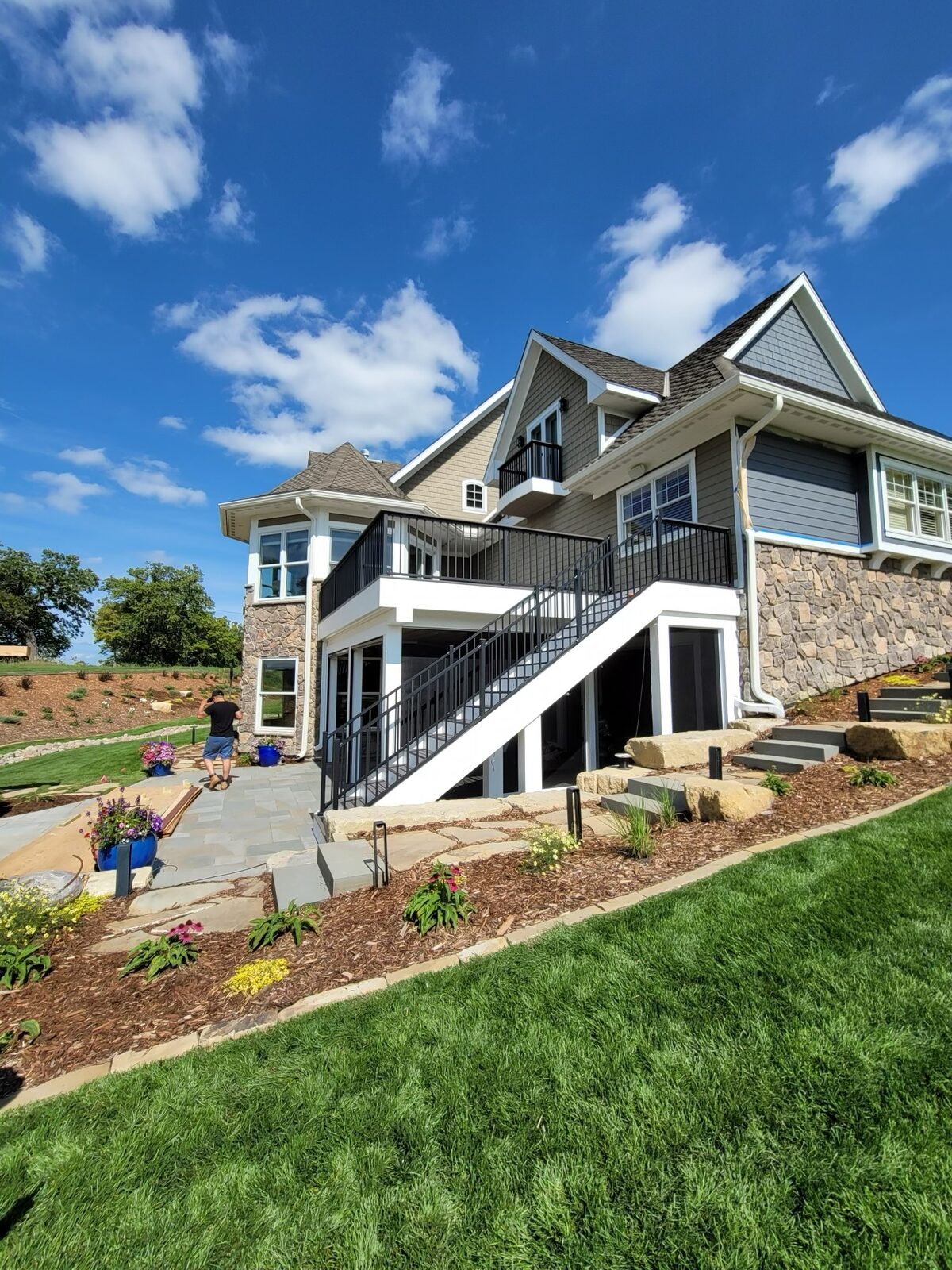 Hillside deck with open stair run