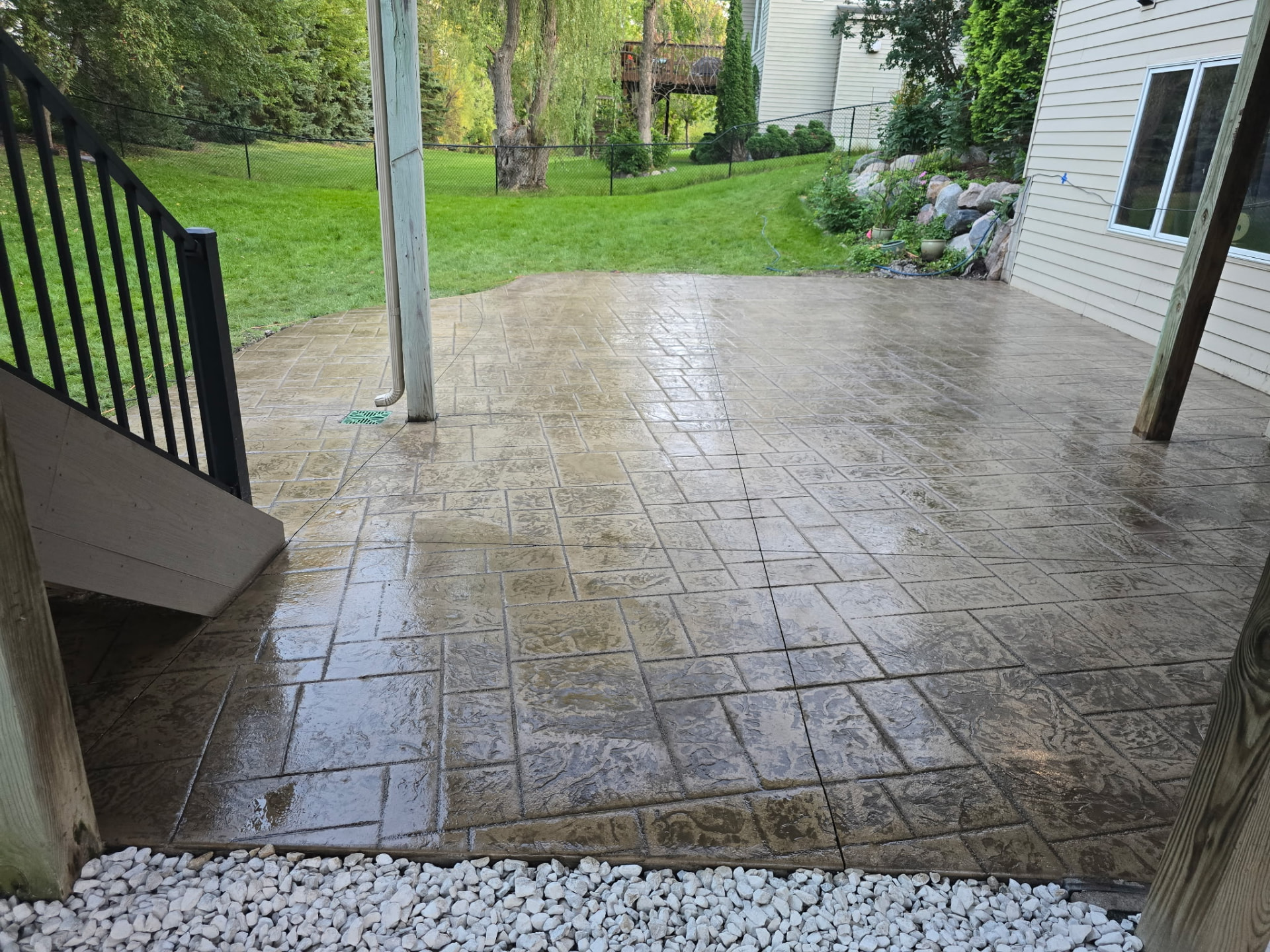 Ashlar stamped patio under deck