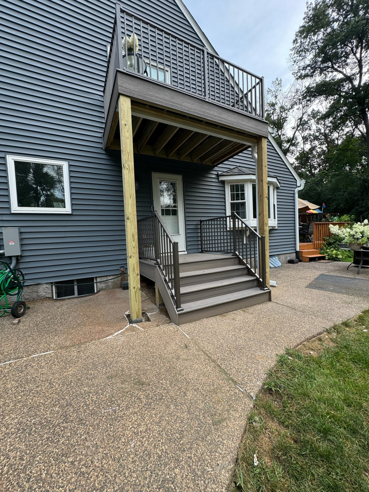 Second-story deck over covered entry